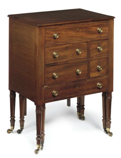 A REGENCY MAHOGANY ENCLOSED DRESSING TABLE