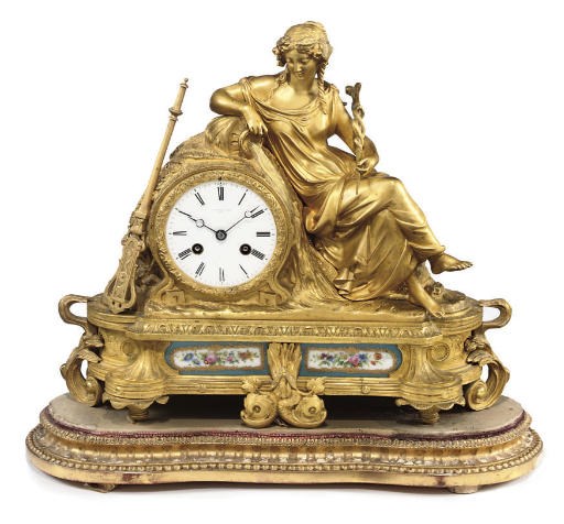 A French ormolu and porcelain-mounted striking eight day mantel clock