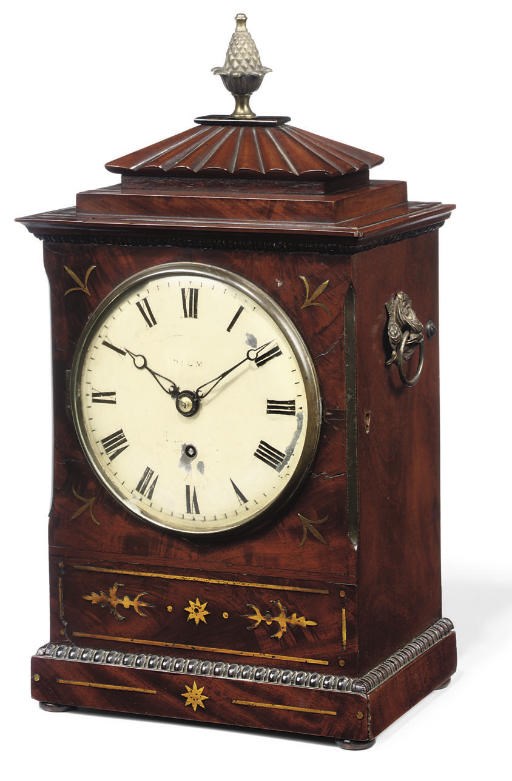 A Willaim IV mahogany and brass-mounted table timepiece