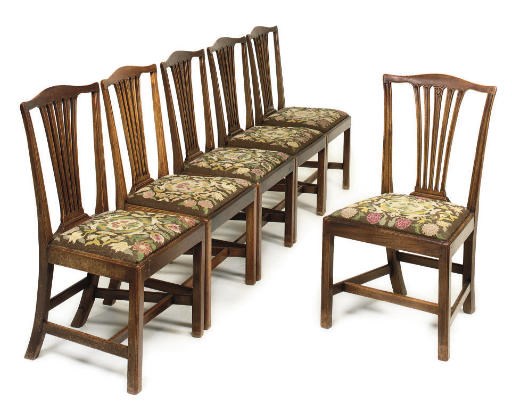 A SET OF SIX GEORGE III MAHOGANY DINING CHAIRS
