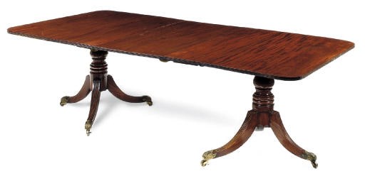 A REGENCY MAHOGANY TWIN PEDESTAL DINING TABLE