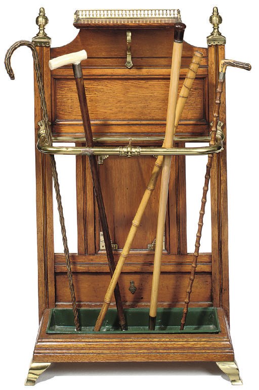 A LATE VICTORIAN OAK AND BRASS-MOUNTED HALL STAND