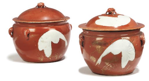 TWO CHINESE CORAL-GLAZED JARS AND COVERS
