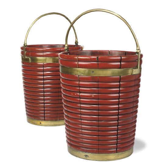 A PAIR OF REGENCY LATER RED-STAINED OAK GADROONED BUCKETS