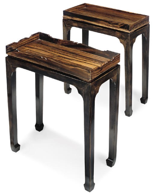 A MATCHED PAIR OF INDIAN CALAMANDER TRAYS-ON-STAND