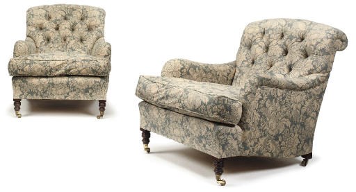 A PAIR OF MODERN BEECH EASY ARMCHAIRS