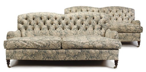A PAIR OF MODERN BEECH TWO SEAT SOFAS