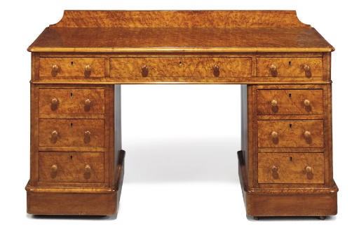 A MID-VICTORIAN BIRD'S-EYE MAPLE PEDESTAL DESK