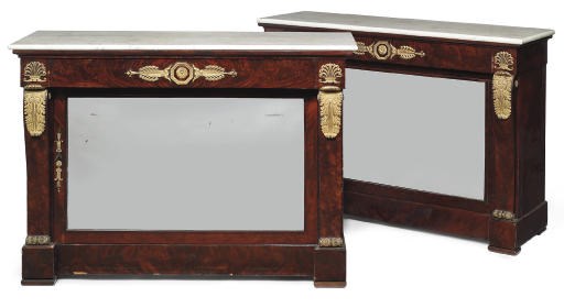 A PAIR OF ITALIAN EMPIRE ORMOLU-MOUNTED MAHOGANY SIDE CABINETS