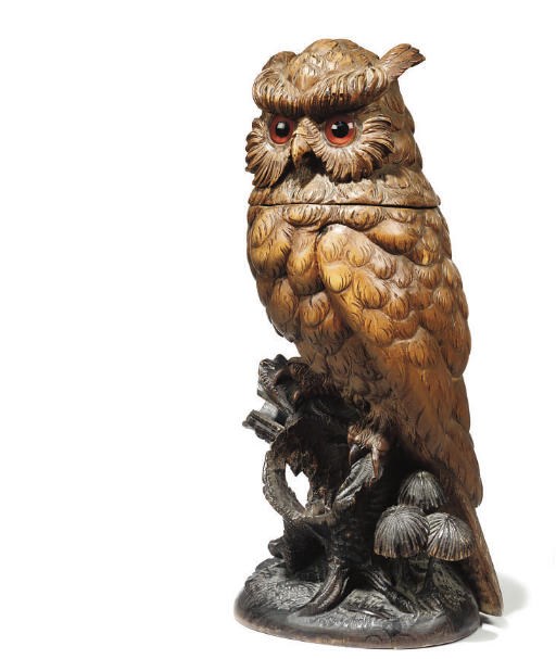 A SWISS 'BLACK FLOREST' CARVED LINDENWOOD OWL TOBACCO JAR