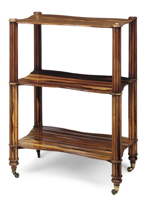 AN EARLY VICTORIAN GONCALO ALVES THREE-TIER ETAGERE