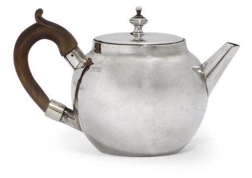 A VICTORIAN SILVER TEAPOT