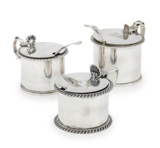 TWO VICTORIAN SILVER MUSTARD-POTS AND A GEORGE V SILVER MUSTARD-POT