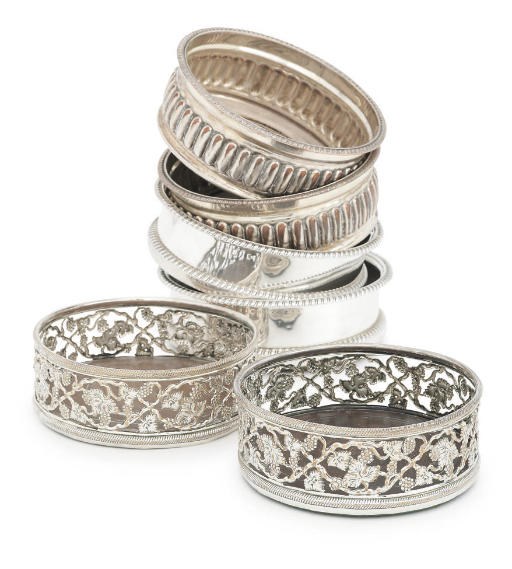 THREE PAIRS OF SILVER-PLATED WINE-COASTERS