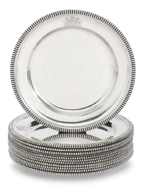 A SET OF TWELVE GEORGE III SILVER SOUP-PLATES