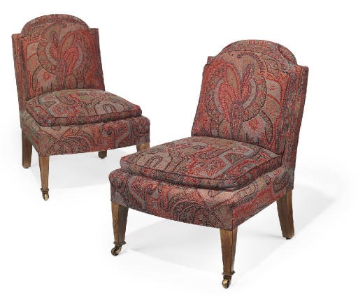 A PAIR OF MAHOGANY PAISLEY UPHOLSTERED LOW SIDE CHAIRS