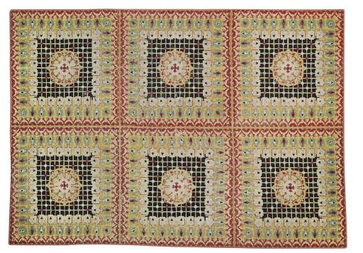 A EUROPEAN GROS POINT NEEDLEWORK CARPET
