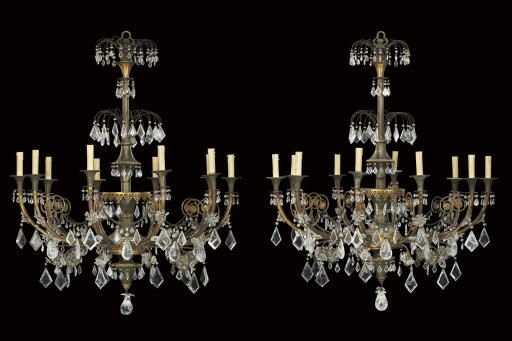 A PAIR OF NORTH EUROPEAN ORMOLU, CUT-GLASS AND ROCK CRYSTAL TEN-LIGHT CHANDELIERS