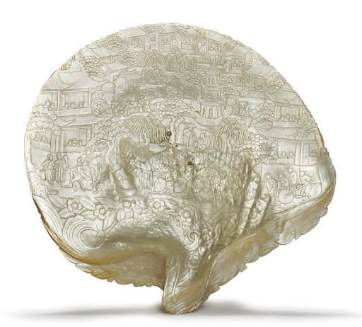 A CHINESE CARVED MOTHER-OF-PEARL SHELL