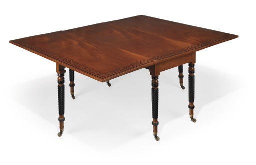 A REGENCY MAHOGANY, EBONISED AND EBONY-INLAID TWIN-FLAP TABLE