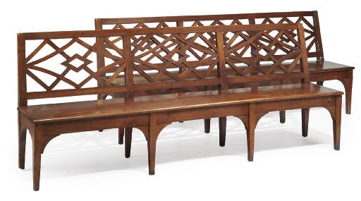 A PAIR OF NORTH ITALIAN WALNUT HALL BENCHES