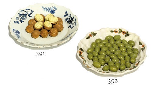 A CONTINENTAL FAIENCE SHAPED CIRCULAR 'TROMPE L'OEIL' PLATE