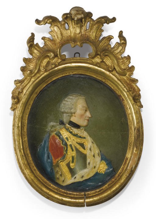 AN ITALIAN POLYCHROME-DECORATED PLASTER RELIEF MEDALLION PORTRAIT OF CARLO EMANUELE III, KING OF SARDINIA (1770-1773)