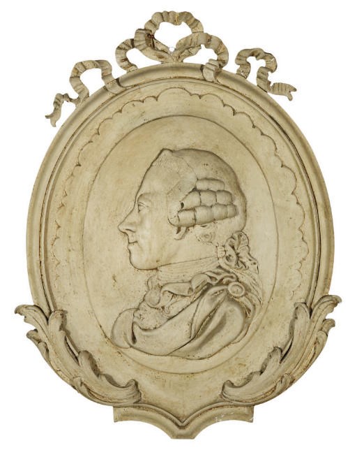 AN ITALIAN WHITE PAINTED PLASTER PROFILE OF CARLO EMANUELE III (1701-1773)