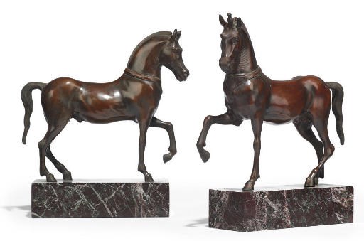 A PAIR OF PATINATED BRONZE CAST MODELS OF HORSES