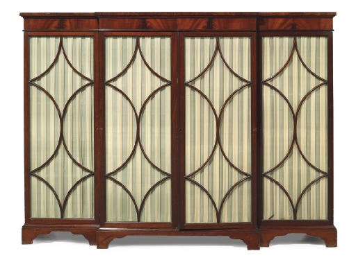 AN EDWARDIAN MAHOGANY BREAKFRONT BOOKCASE