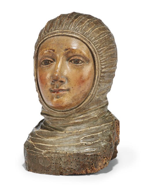 AN ITALIAN POLYCHROME DECORATED CARVED HEAD OF A FEMALE SAINT