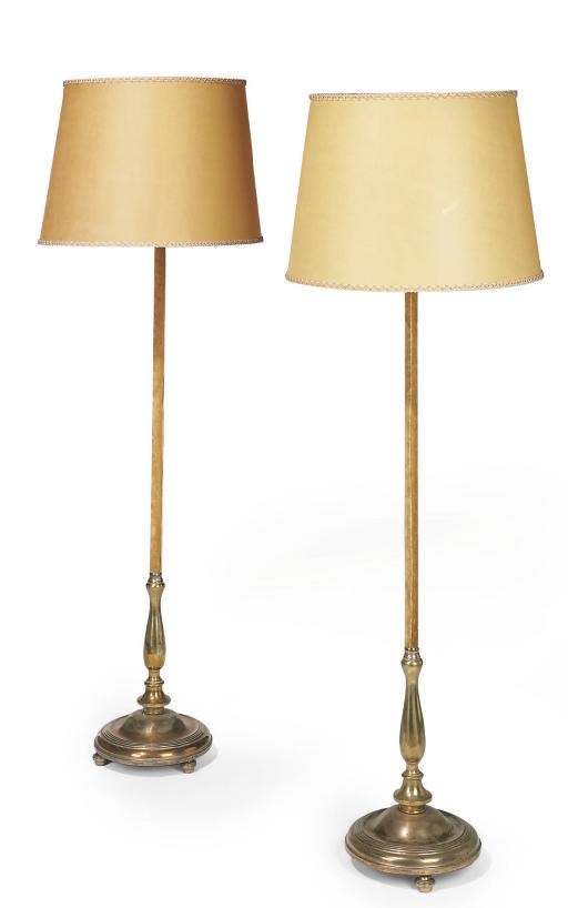 A PAIR OF BRASS AND VELVET-COVERED STANDARD LAMPS