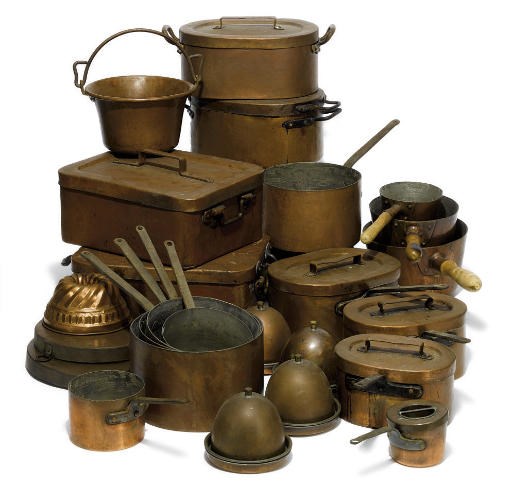 A LARGE COPPER BATTERIE DE CUISINE