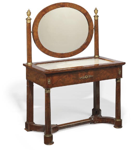 A LATE EMPIRE ORMOLU-MOUNTED MAHOGANY COIFFEUSE