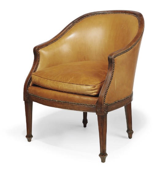 A NORTH ITALIAN WALNUT TUB ARMCHAIR