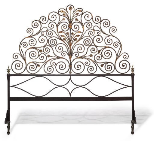 AN ITALIAN GILT BRONZE, RED-PAINTED AND PARCEL-GILT IRON HEADBOARD