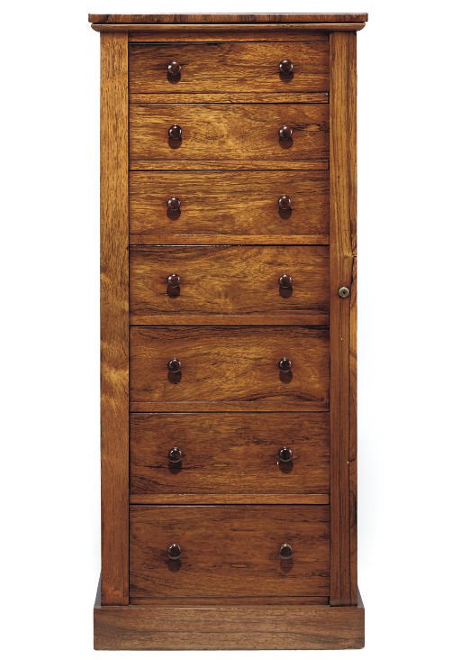 AN EARLY VICTORIAN ROSEWOOD WELLINGTON CHEST