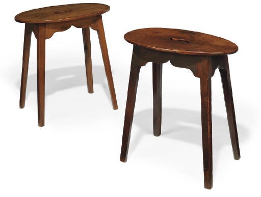 A LATE GEORGIAN PROVINCIAL OVAL WALNUT STOOL