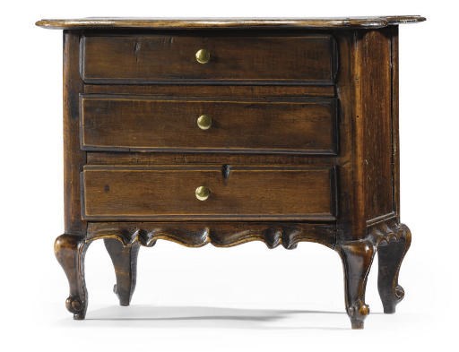 A WALNUT AND STAINED POPLAR MINIATURE COMMODE