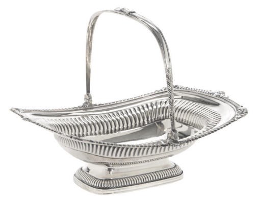 A GEORGE III SILVER CAKE BASKET,