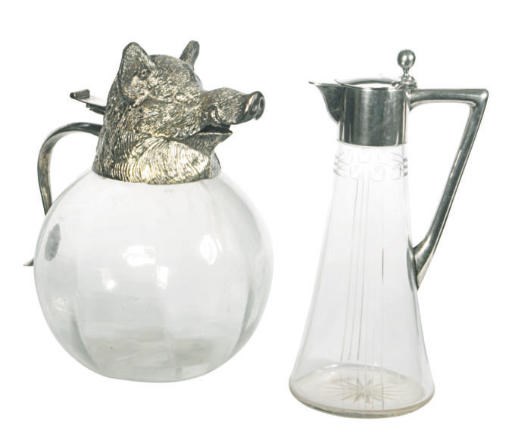 AN AUSTRO-HUNGARIAN SILVER-MOUNTED DECANTER AND A CONTINENTAL SILVER-PLATED DECANTER,