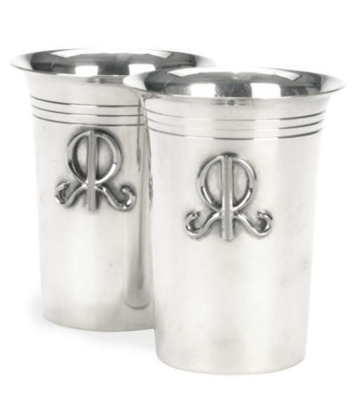 TWO AMERICAN SILVER BEAKER CUPS AND THIRTEEN SILVER-PLATED BEAKER CUPS, TWELVE KNIFE RESTS, AND A BELT BUCKLE,