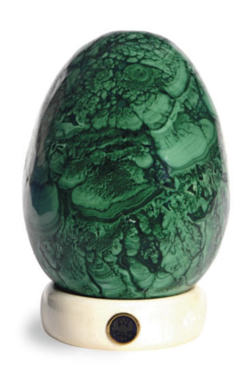 A CONTINENTAL MALACHITE EGG AND ASSOCIATED IVORY STAND,**