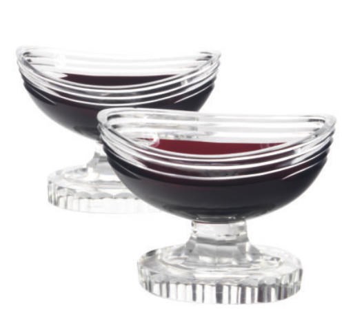 A PAIR OF CONTINENTAL RUBY AND CLEAR CUT-GLASS FOOTED OVAL MASTER SALTS,