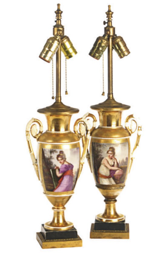A PAIR OF PARIS PORCELAIN GOLD-GROUND MASK-HANDLED VASES PAINTED WITH BEAUTIES EMBLEMATIC OF ARTS MOUNTED AS LAMPS,