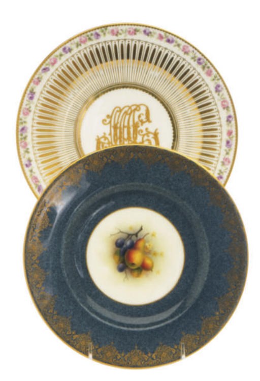 TWENTY-THREE ENGLISH PORCELAIN POWDERED TEAL BLUE-GROUND DESSERT PLATES AND ELEVEN LIMOGES GILT-MONOGRAMMED DESSERT PLATES,