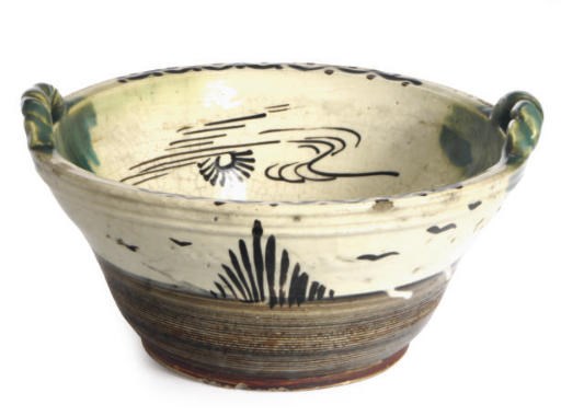 A JAPANESE ORIBE STYLE TWO-HANDLED BOWL,