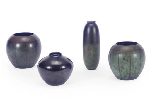 A PAIR OF GERMAN PATINATED BRONZE VASES,