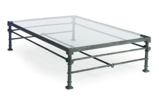 A CAST IRON AND GLASS LOW COFFEE TABLE,