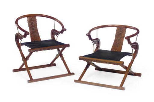 TWO SIMILAR CHINESE HARDWOOD FOLDING ARMCHAIRS,